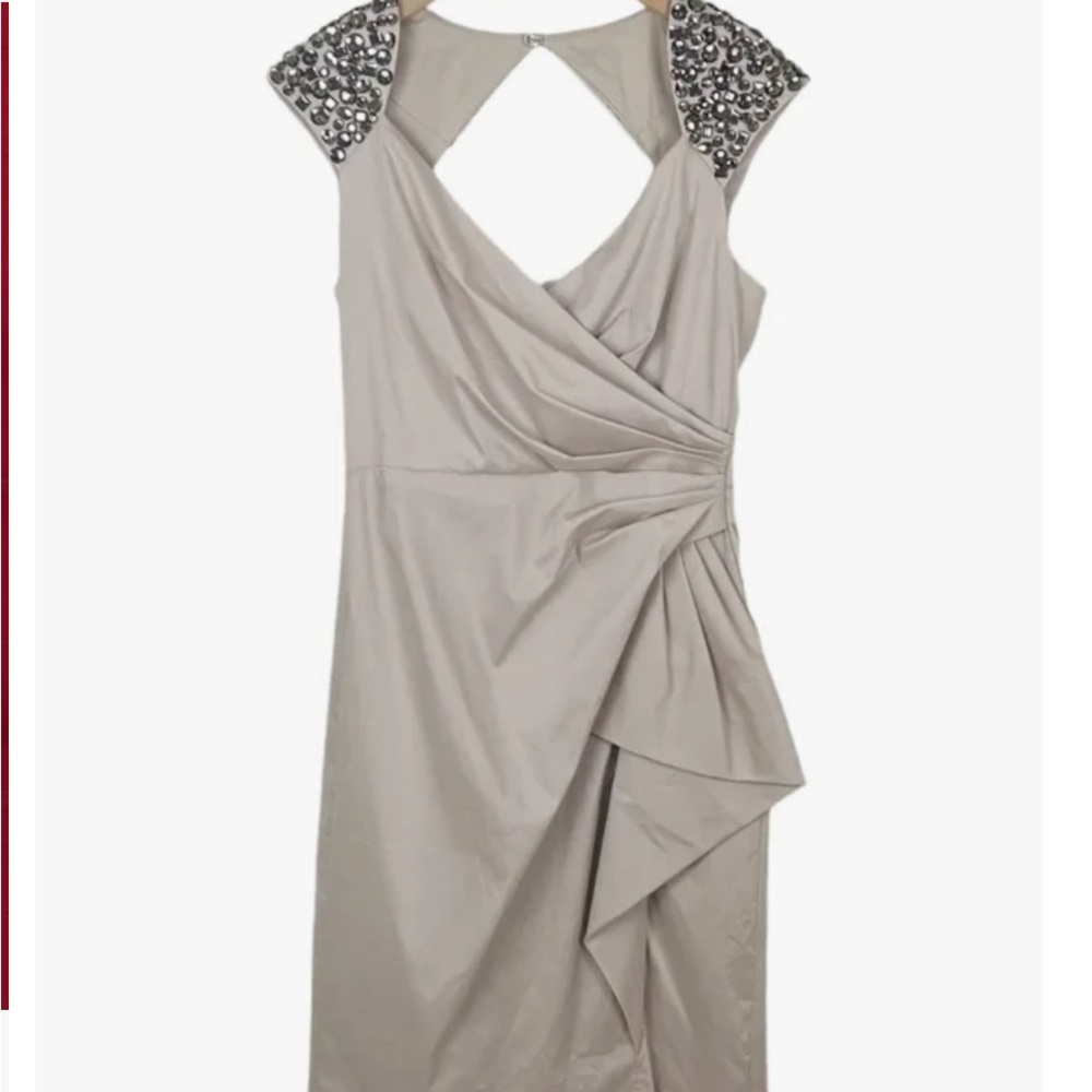 Only wore once to holiday party.
